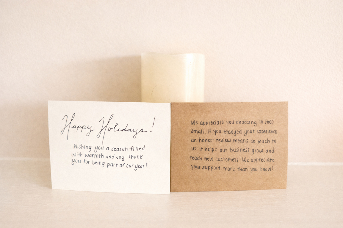 Handwritten cards with warm candlelight